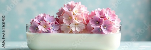 Exotic hydrangeas suspended in a glass container filled with clear milk, frozen, botanical still life, milk
