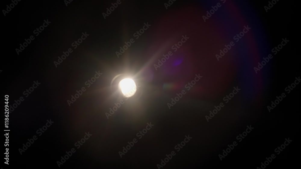 Real optical lens flare on black background Real optical lens flare on black background