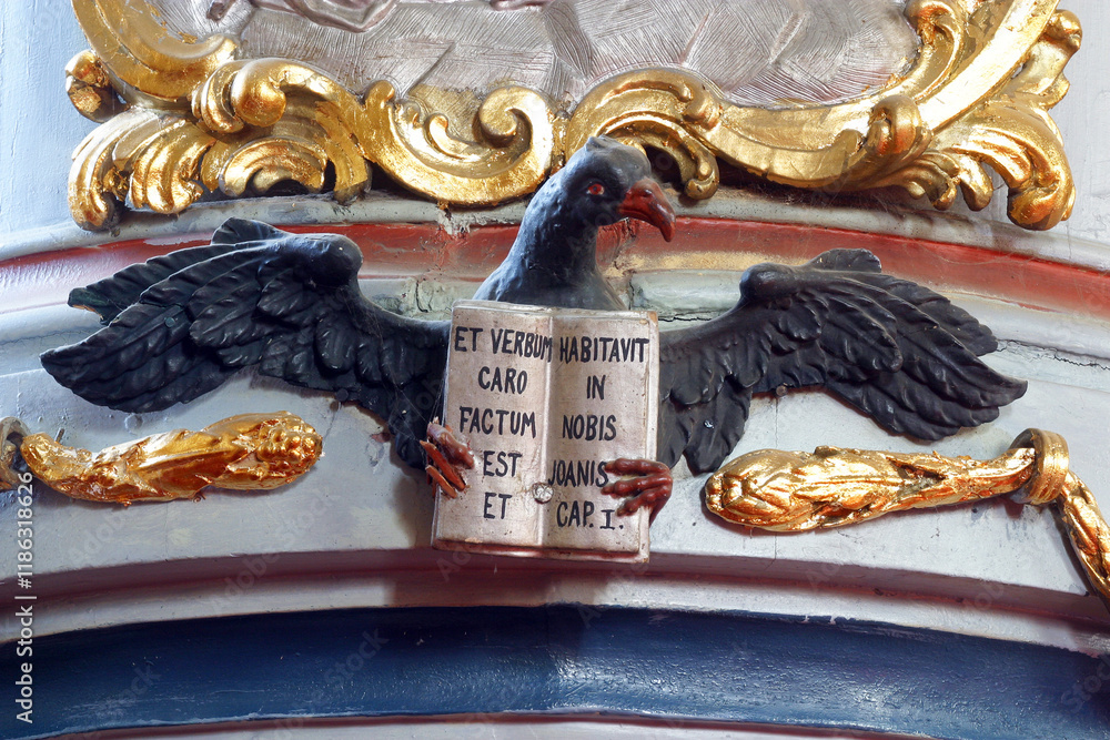 Φωτογραφία Symbol of Saint John the Evangelist, statue on the pulpit in the parish church o