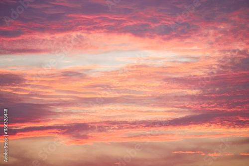 Fototapeta Naklejka Na Ścianę i Meble -  Sunset in the sky in pastel colors. Purple and pink sky with clouds in the evening. Nature background.
