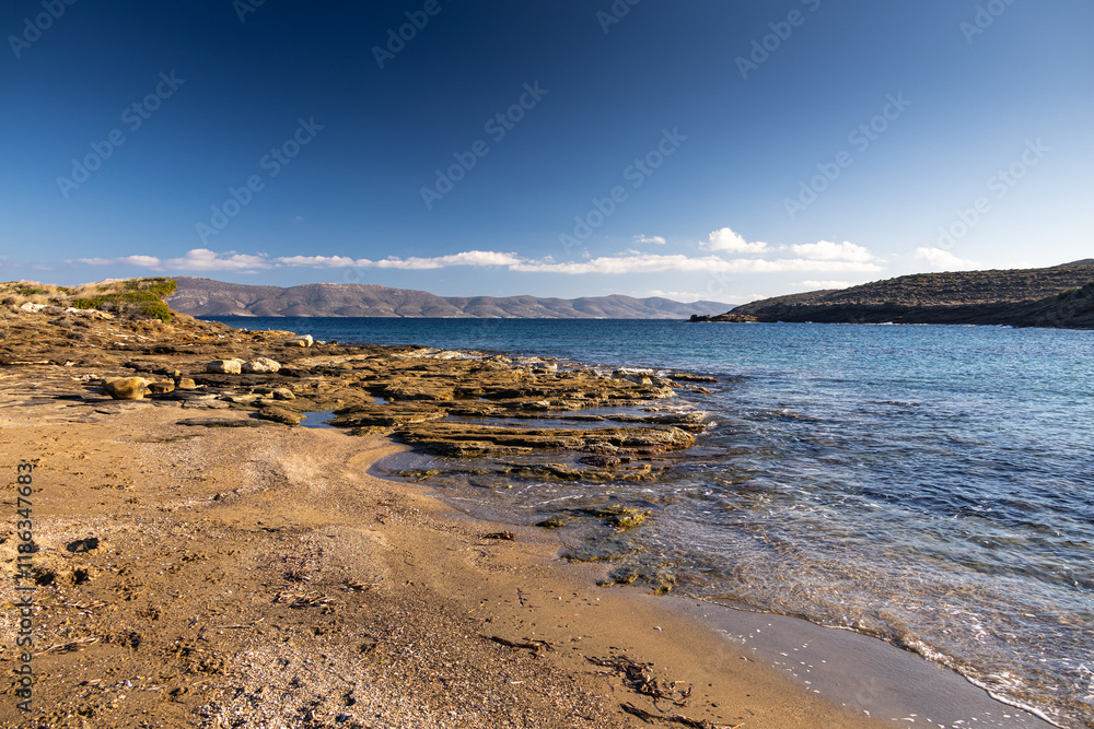 Gold Moon Beach. Beautiful landscape of the sea of Greece during a sunny day in Mikrolimano. Travel to Greece.