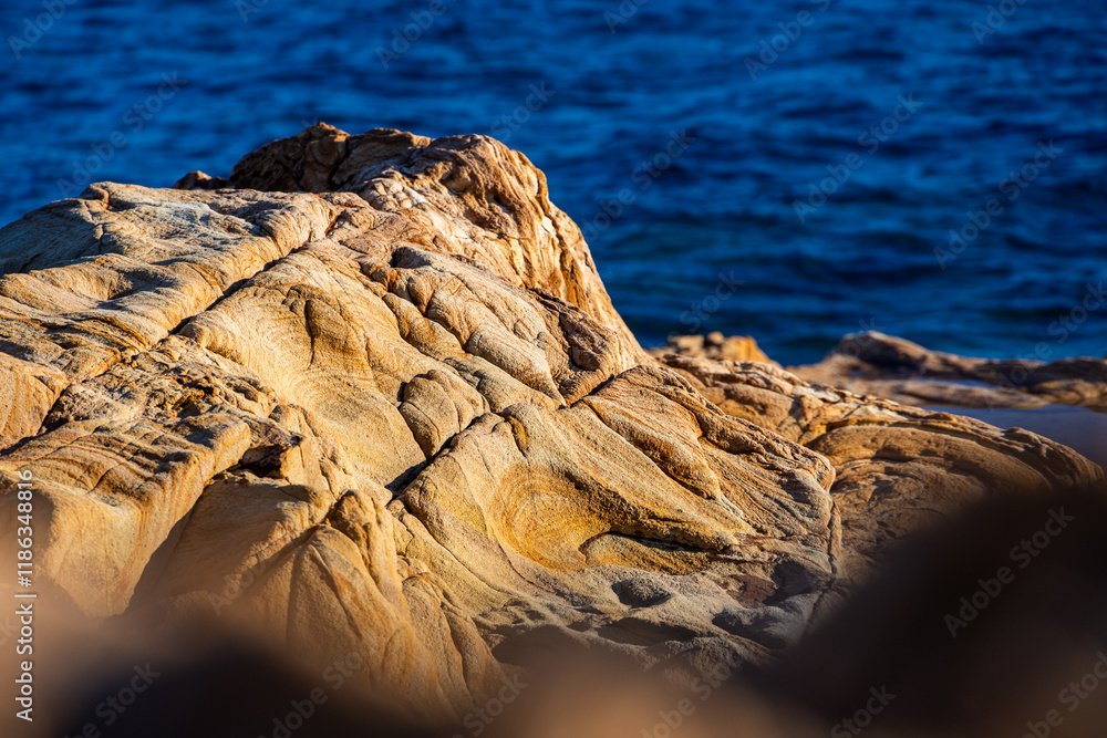 Sea side cliff rocks texture. Amazing abstract photo with the textures created by water during long time in the rocks from Mediterranean Sea.