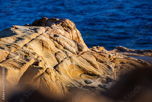 Sea side cliff rocks texture. Amazing abstract photo with the textures created by water during long time in the rocks from Mediterranean Sea.