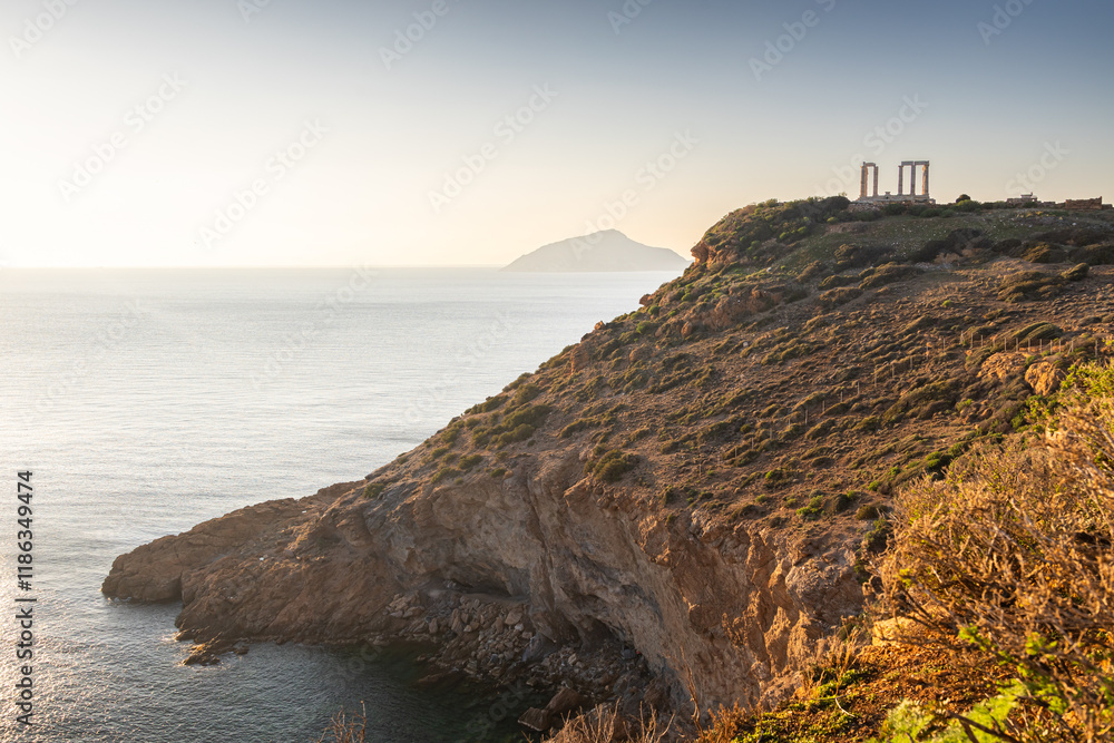 Cape Sounion and Temple of Poseidon. Beautiful sunset over Mediterranean Sea in Greece next to Posideon Temple and Sounion Cape. Amazing landscapes of Greece.