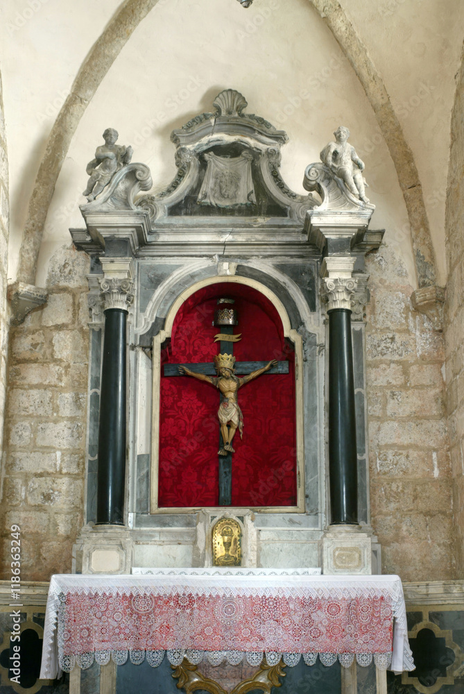 Altar of Holy Cross in the church of Assumption of the Virgin Mary in Pag, Croatia