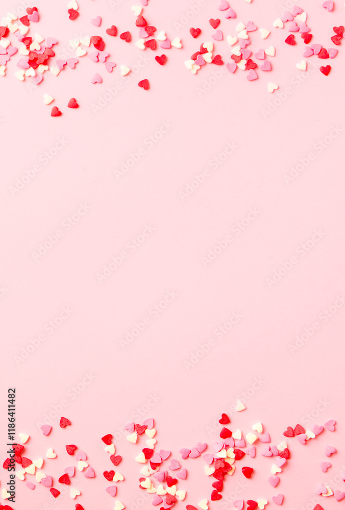 Sugar hearts frame on pink background. Romantic, St Valentines day concept. Top view. Copy space.
