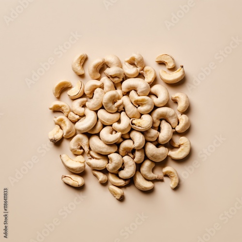 Cashew nuts arranged on a flat surface