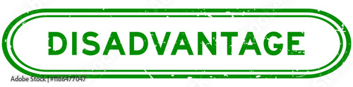 Grunge green disadvantage word rubber seal stamp on white background
