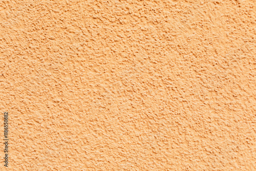 Wallpaper Mural Close-up of peach colored textured stucco wall with rough surface pattern. Torontodigital.ca
