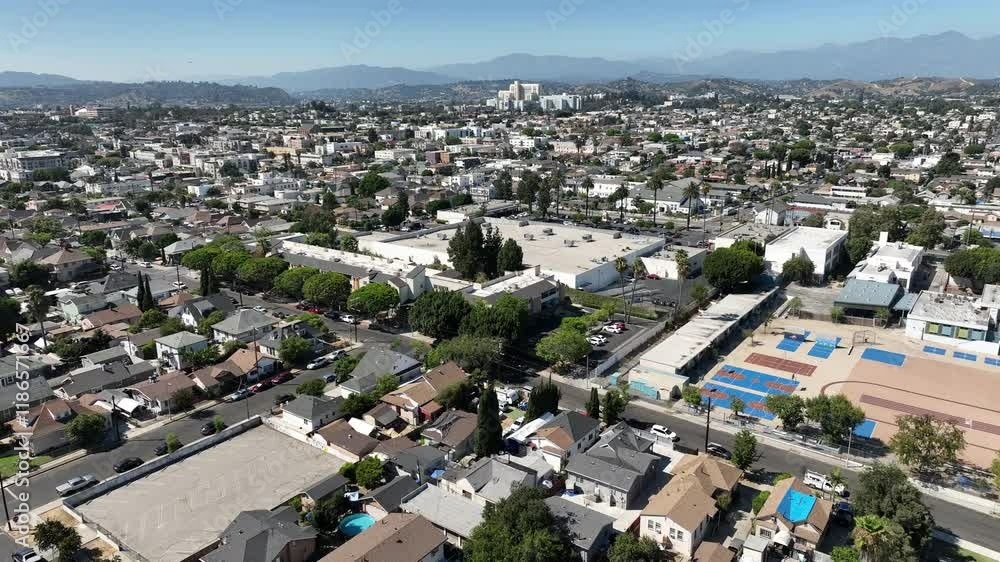 East Los Angeles and San Gabriel Mountains Aerial Shot Forward Tilt Up California USA East Los Angeles and San Gabriel Mountains Aerial Shot Forward Tilt Up California USA