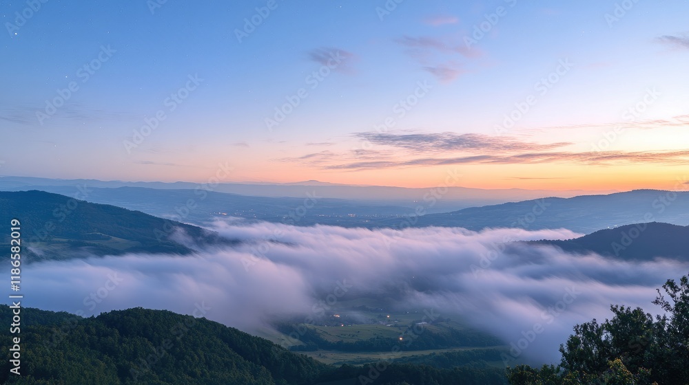 Serene Morning Landscape with Misty Valleys and Soft Clouds Under a Twilight Sky Serene Morning Landscape with Misty Valleys and Soft Clouds Under a Twilight Sky