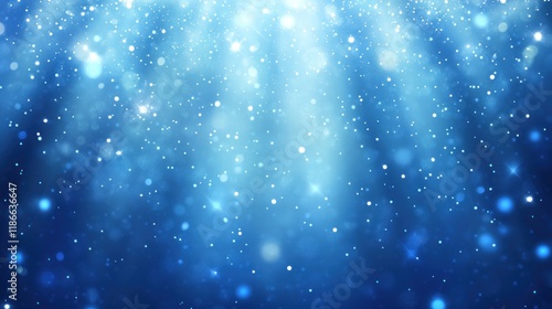 Abstract blue sparkle background with bokeh lights and falling snow effect.