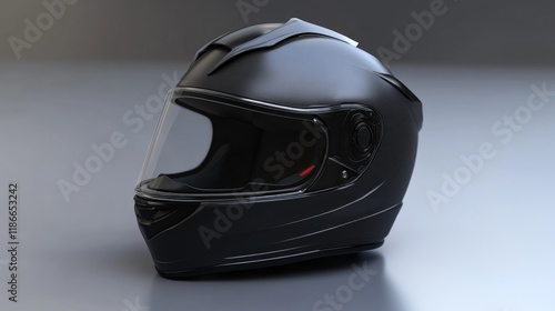 A close-up of a black motorcycle helmet on a white surface photo