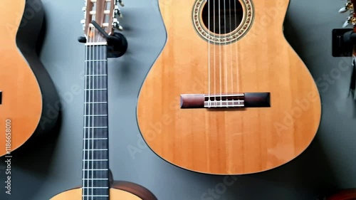 Many acoustic guitars in music shop