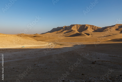 Stunning desert landscape in Kunduz Province, Afghanistan during golden hour photo