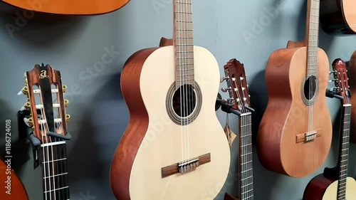 Many acoustic guitars in music shop