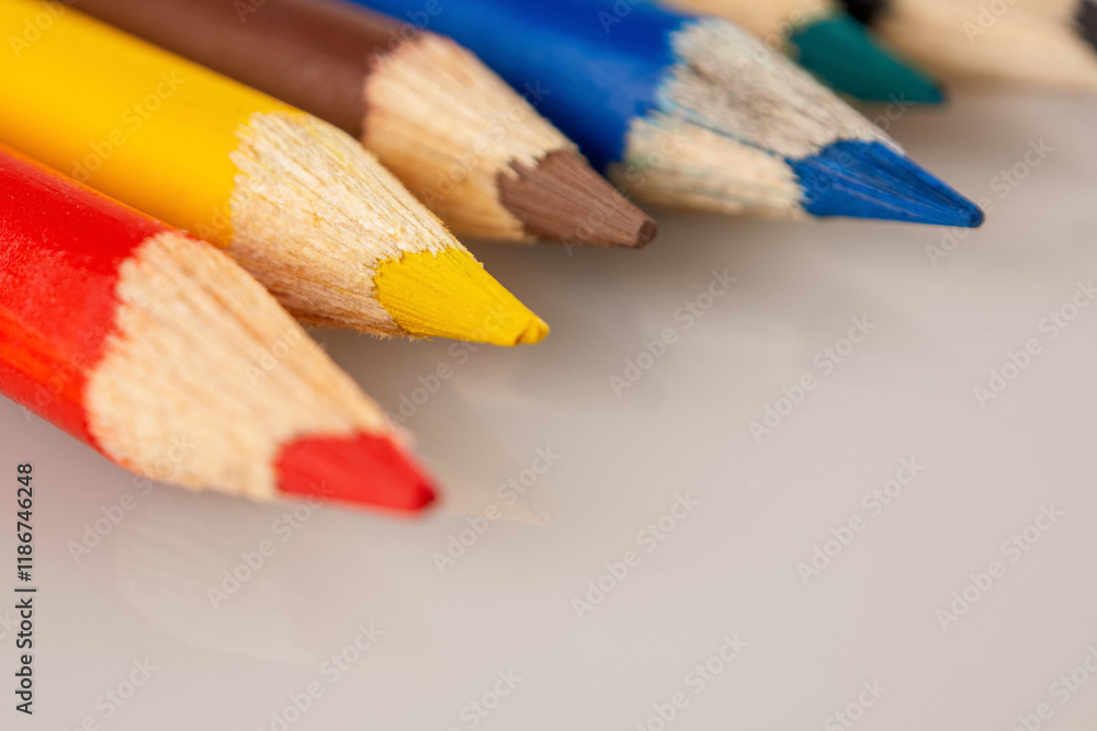 A macro shot of colored pencils showing the vibrant hues and details that inspire creativity and the art of drawing