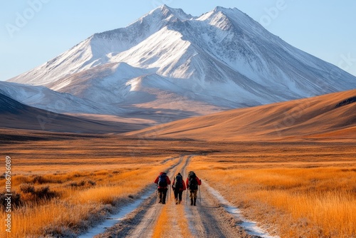 A view of the Chimgan Mountains, with hikers exploring the scenic trails under a clear sky photo