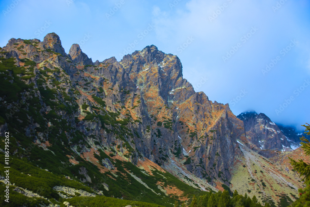 Fototapeta premium Rugged sunlit mountain peaks of the High Tatras in Mala Studena dolina, Slovakia
