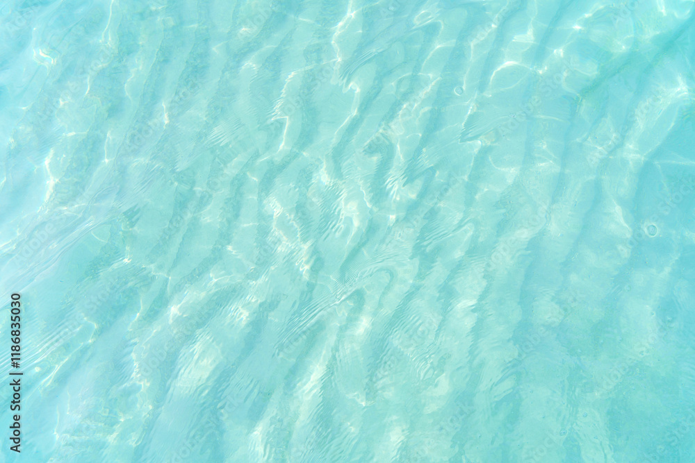 Obraz premium blue water surface with reflection and ripples