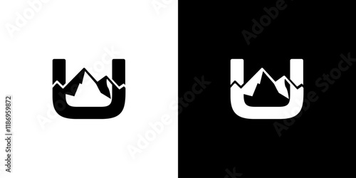 U letter logo design with mountain silhouette in the middle