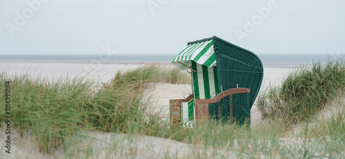 Strandkorb in den Dünen der Nordseeküste photo