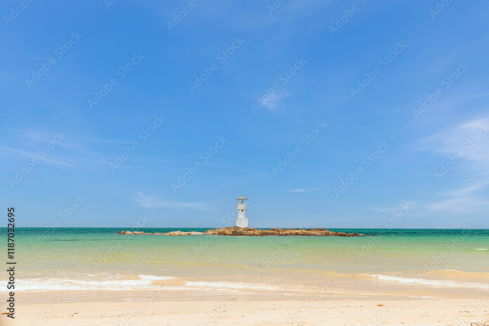 Fototapeta premium A Lighthouse on the beautiful beach with blue sky in Khao Lak, a destination of tourist in Phang-Nga province, Southern of Thailand