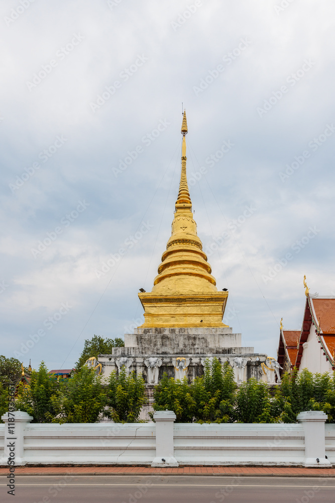 Fototapeta premium Wat Phra That Chang Kham, a famous temple and popular tourist destination in Nan province, Northern of Thailand