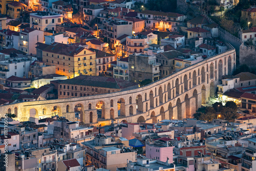 Bild auf Leinwand Panoramic view of the Roman aqueduct and part of the city of Kavala in eastern G