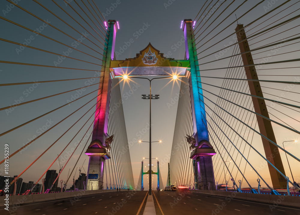 Beautiful scenery of Thotsamarachan Bridge (Rama IX Bridge) crossing Chao phraya river with evening sky in the background. use it as your Wallpaper, Poster and Copy space, Selective focus.