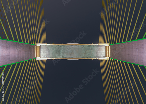 Obraz na płótnie Looking up view Cable-stayed bridge of Thotsamarachan Bridge or King Rama X Bridge with evening sky in the background. use it as your Wallpaper, Poster and Space for text, Selective focus. w salonie