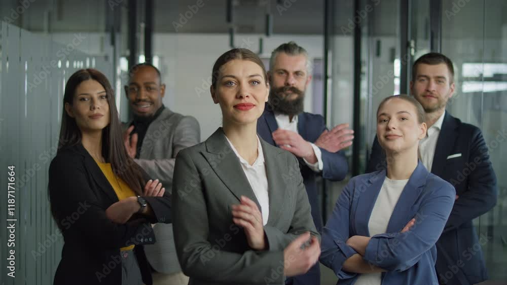Group of confident business professionals walking together in an office hallway, showcasing teamwork, leadership, and professionalism. Concept of corporate success and diversity Group of confident business professionals walking together in an office hallway, showcasing teamwork, leadership, and professionalism. Concept of corporate success and diversity