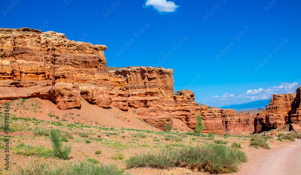 Charyn Canyon, Valley of Castles. The excellence of Kazakhstan. Panorama of natural unusual landscape. The red canyon of extraordinary beauty looks like a Martian landscape. Charyn Canyon, Valley of Castles. The excellence of Kazakhstan. Panorama of natural unusual landscape. The red canyon of extraordinary beauty looks like a Martian landscape.