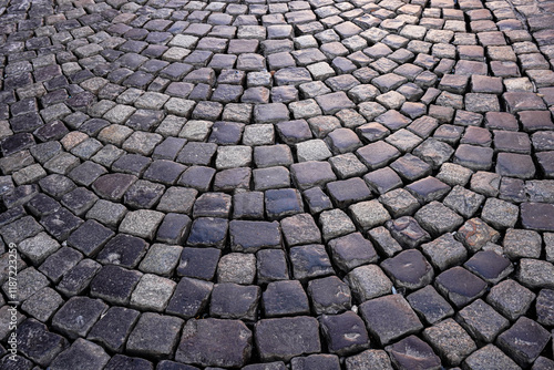 A detailed cubic stone pavement texture as a wallpaper or background pattern