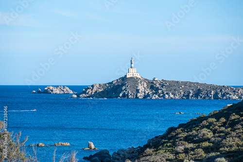Obraz na płótnie The lighthouse overlooking the cliffs of Isola dei Cavoli in Villasimius w salonie