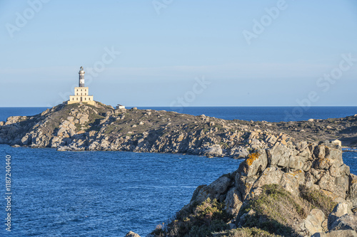 Obraz na płótnie The lighthouse overlooking the cliffs of Isola dei Cavoli in Villasimius w salonie