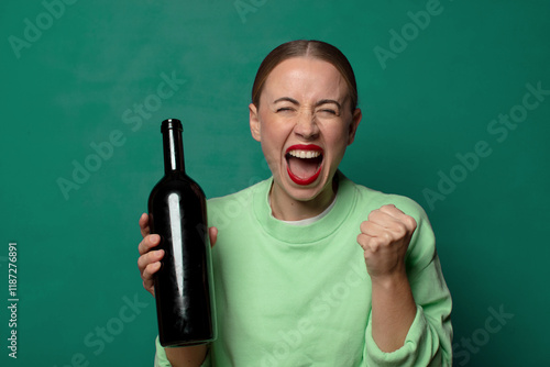 Photos young blonde woman with a wine bottle and copy space