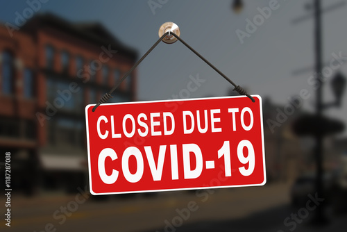 Close-up on a red closed sign in the window of a shop displaying the message 