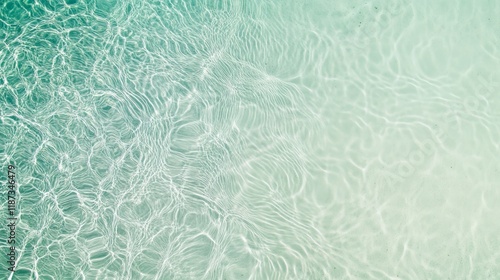 Sunlight creates mesmerizing patterns on the bottom of a pristine swimming pool, inviting guests to enjoy a refreshing dip on a perfect summer day