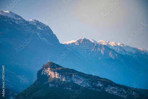 Famous hill above Arco in Italy, near by Lake Garda. Alps mountains in background