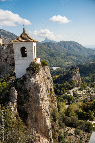 City sight Alcazaiba Fortress and observation tower. Guadalest, Spain photo