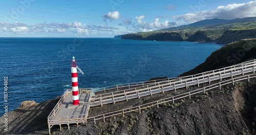 Aerial view of the Fenais da Ajuda Lighthouse in Fenais Da Ajuda city, Sao Miguel island, Portugal photo