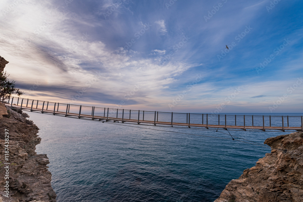 Fototapeta premium Hanging walkway of Jolúcar, a walkway with views of the Mediterranean Sea in the municipality of Torrenueva Costa, Granada, Andalusia.