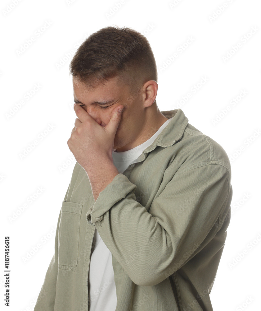 Distressed young man crying on white background Distressed young man crying on white background