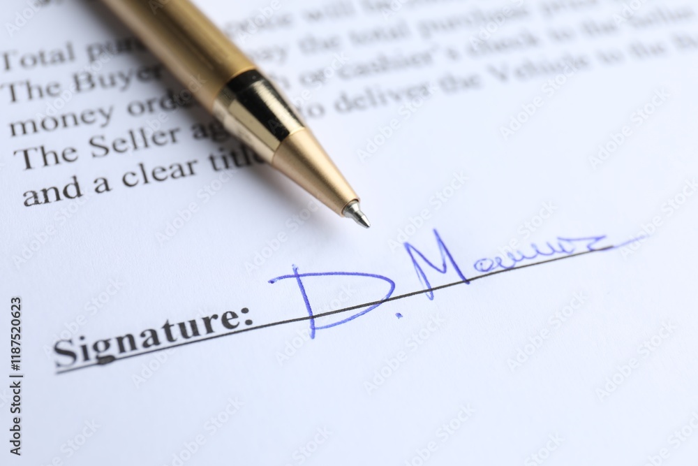 Ballpoint pen and signature on contract, closeup Ballpoint pen and signature on contract, closeup
