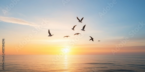 Seagulls gracefully soar over a tranquil sea during a stunning sunset, capturing the serene beauty of nature's transition from day to night.
