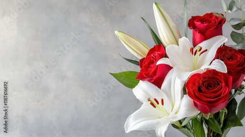 A lush arrangement of red roses and white lilies designed for Valentine's Day gifting