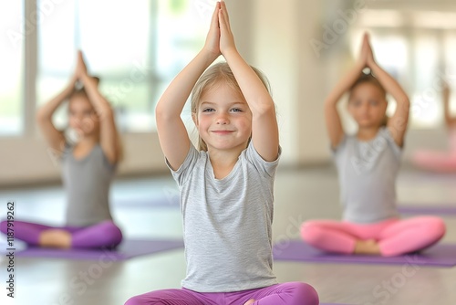 Group of children practicing yoga in a classroom, kids meditation and mindfulness exercises