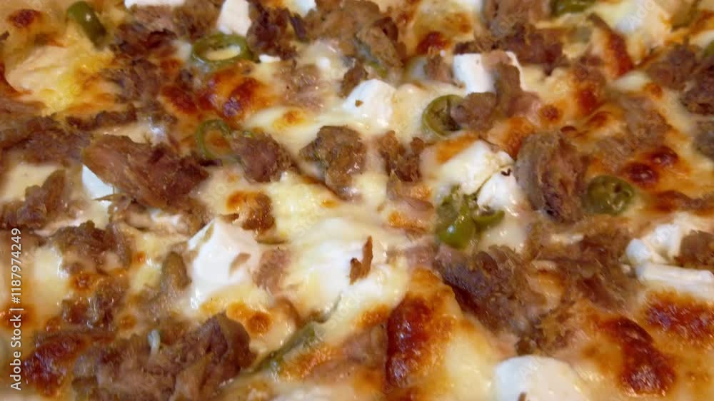 Delightful tuna pizza topped with capers and creamy cheese fusion Delightful tuna pizza topped with capers and creamy cheese fusion