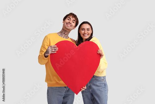 Happy young couple holding ...